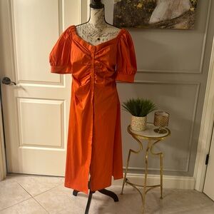 Long orange New York and Company top. you can wear it with short or with jeans